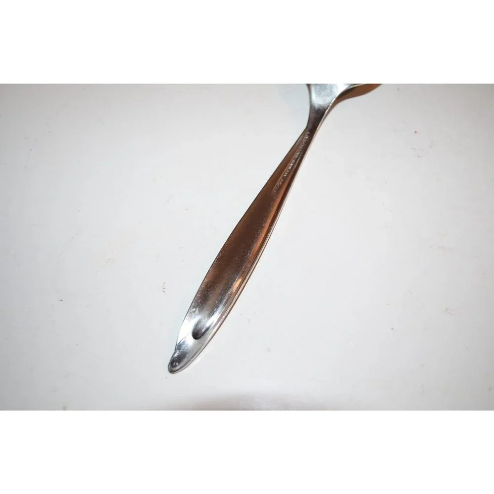 International Deluxe AMERICANA slotted Pierced Serving Spoon  8 1/2